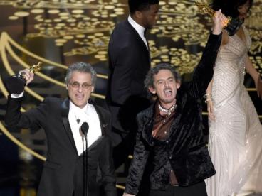 Mark Mangini, left, and David White accept the award for best sound editing for “Mad Max: Fury Road”.Source:AP